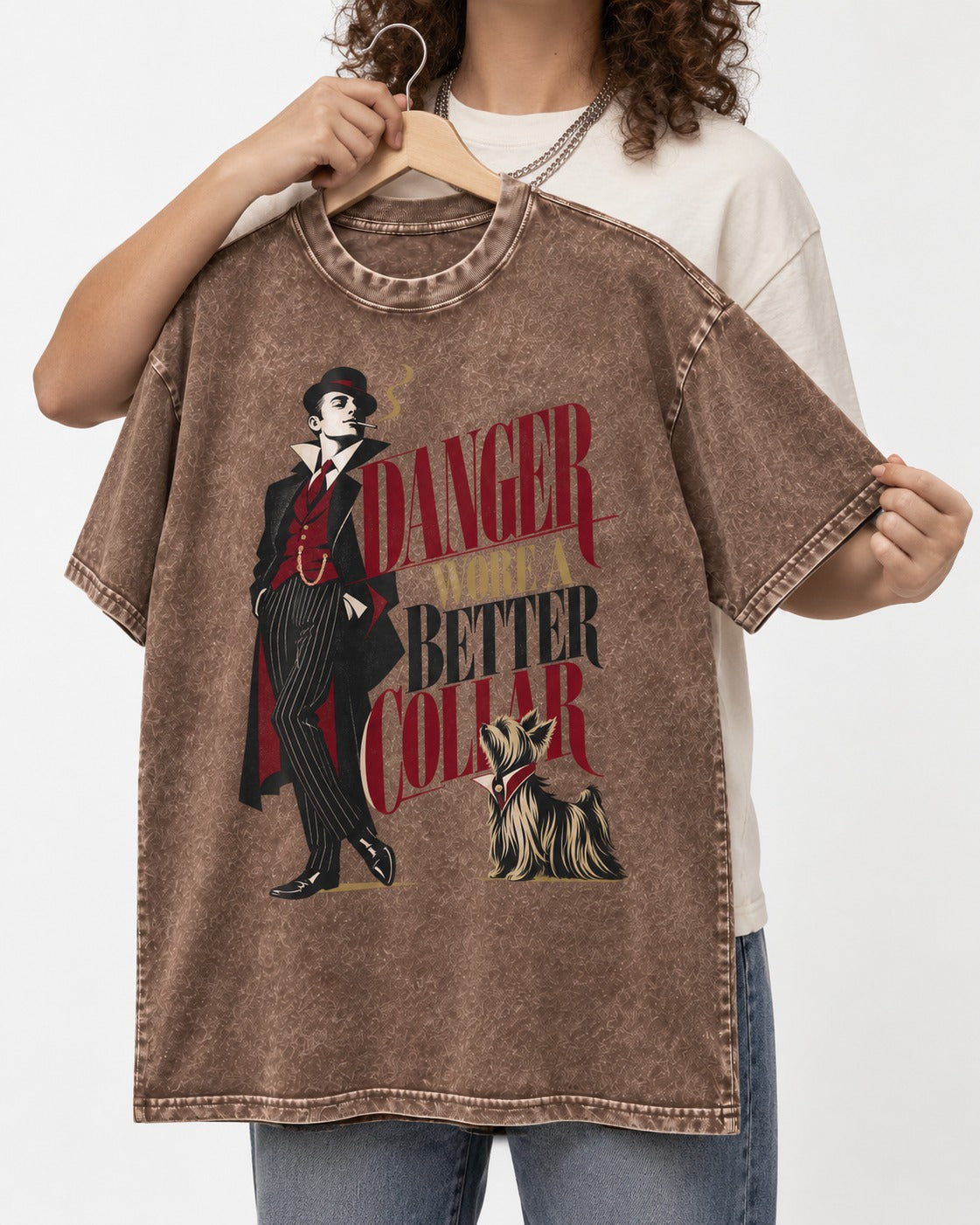 Yorkshire Terrier Danger Wore a Better Collar Art Deco Graphic Washed Tee in Coffee, held up on a hanger