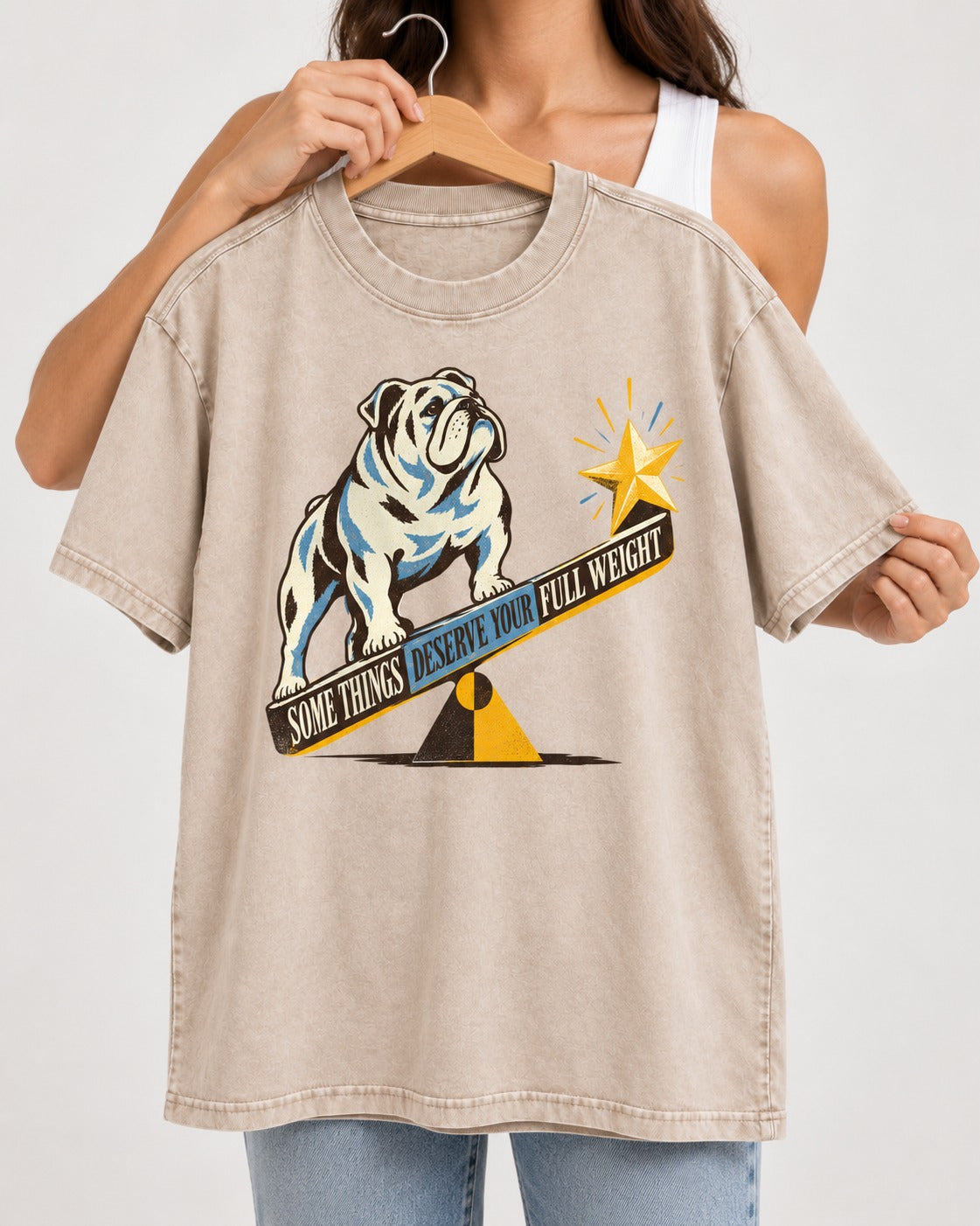 Some Things Deserve Your Full Weight English Bulldog Graphic Washed Tee in Apricot, held up on a hanger