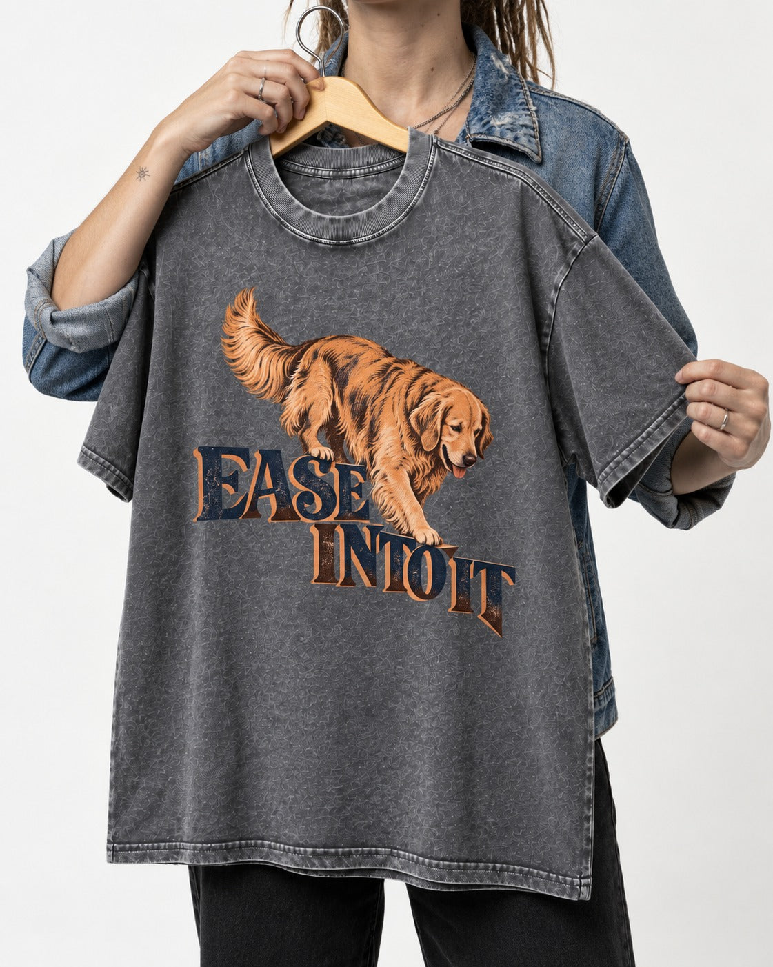 Golden Retriever Ease Into It Washed Tee in Gray, held up on a hanger