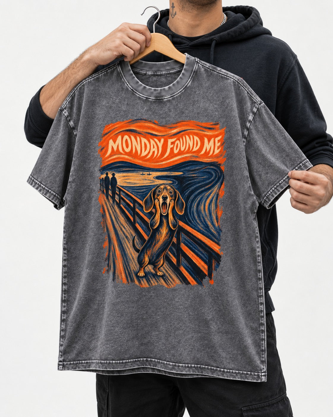 Dachshund Monday Found Me Scream Poster Washed Tee in Gray, held up on a hanger