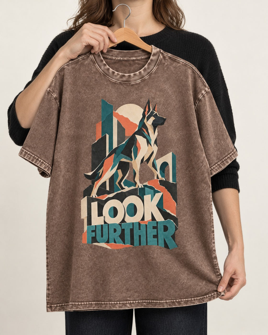 Look Further German Shepherd Dog Washed Tee in Coffee, held up on a hanger