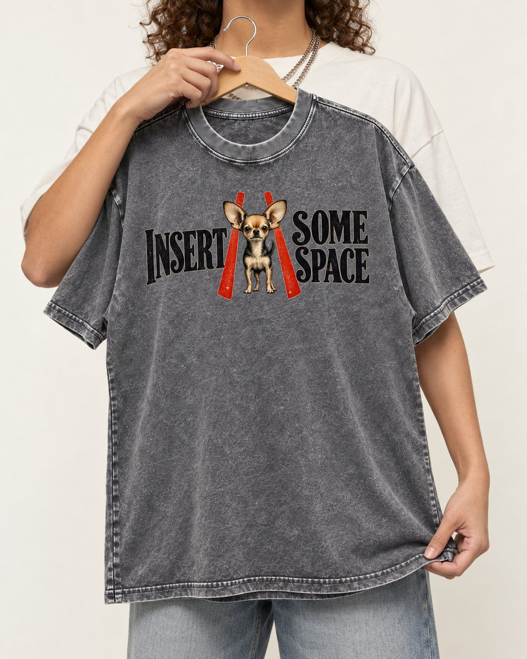 Insert Some Chihuahua Space Washed Tee in Gray, held up on a hanger
