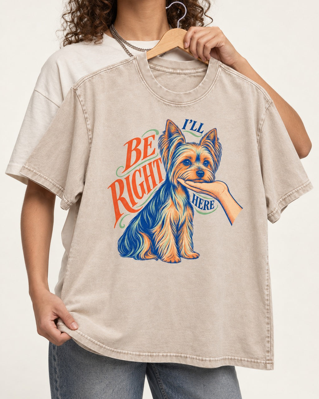 Yorkshire Terrier I'll Be Right Here Washed Tee in Apricot, held up on a hanger