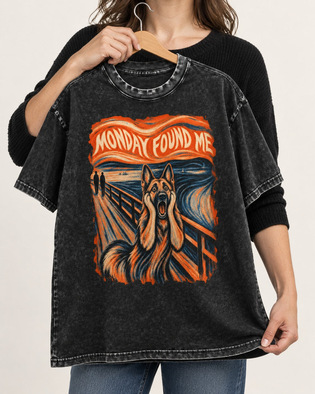 German Shepherd Dog Monday Found Me Scream Graphic Washed Tee in Black, held up on a hanger