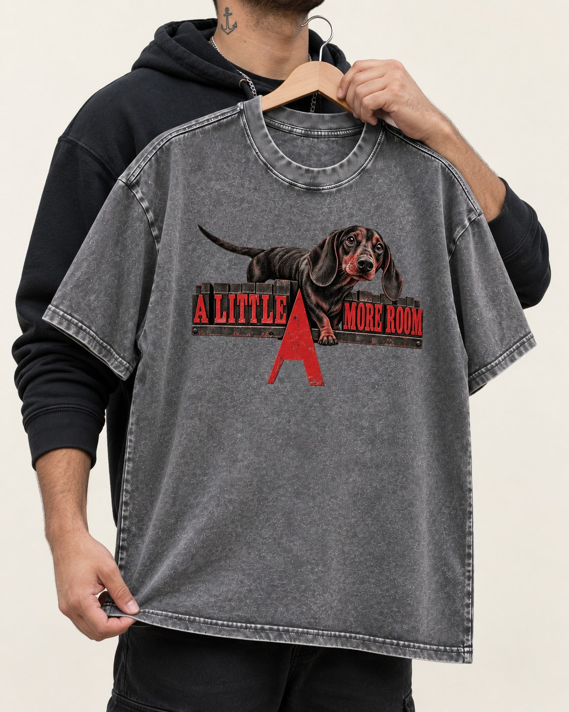 More Room for Dachshund Washed Tee in Gray, held up on a hanger