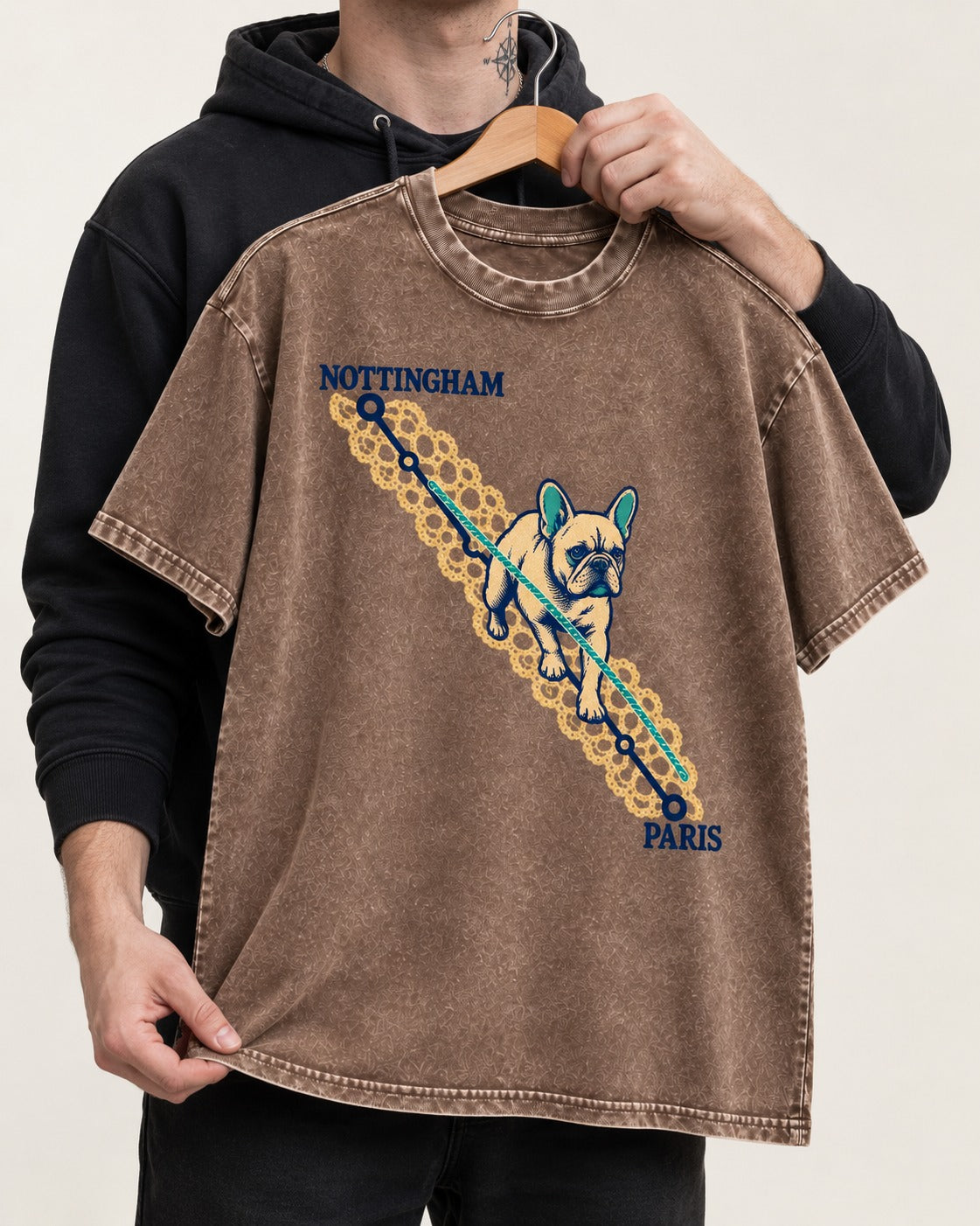 Nottingham to Paris Frenchie Washed Tee in Coffee, held up on a hanger
