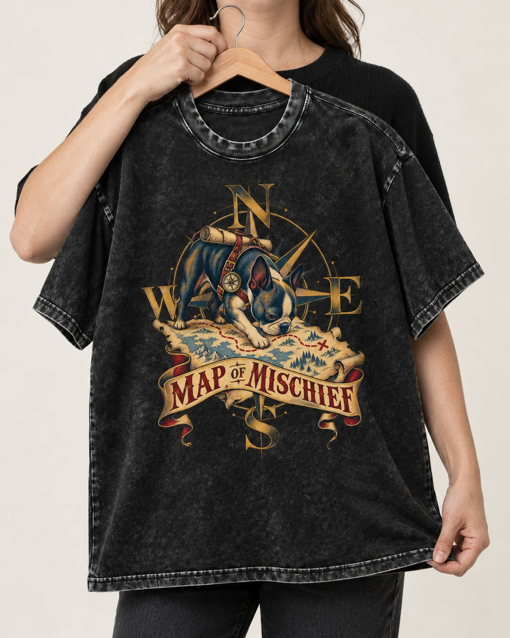 Map of Mischief Boston Terrier Washed Tee in Black, held up on a hanger