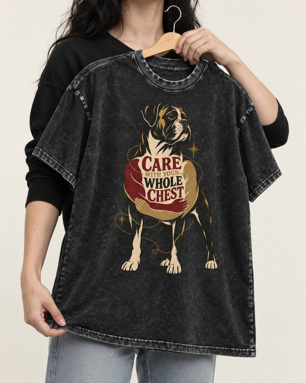 Boxer Care With Your Whole Chest Washed Tee in Black, held up on a hanger