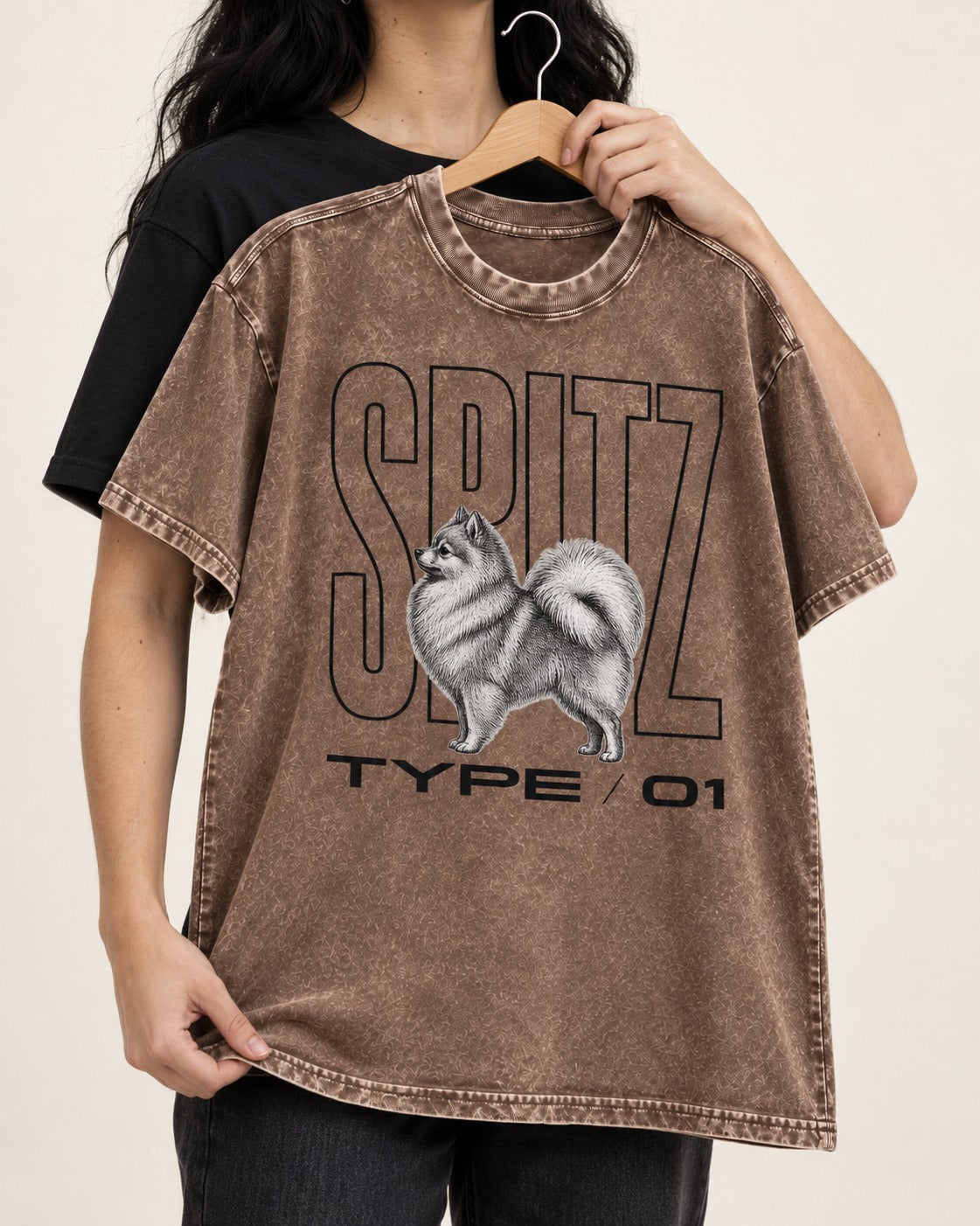 Pomeranian Spitz Washed Tee in Coffee, held up on a hanger