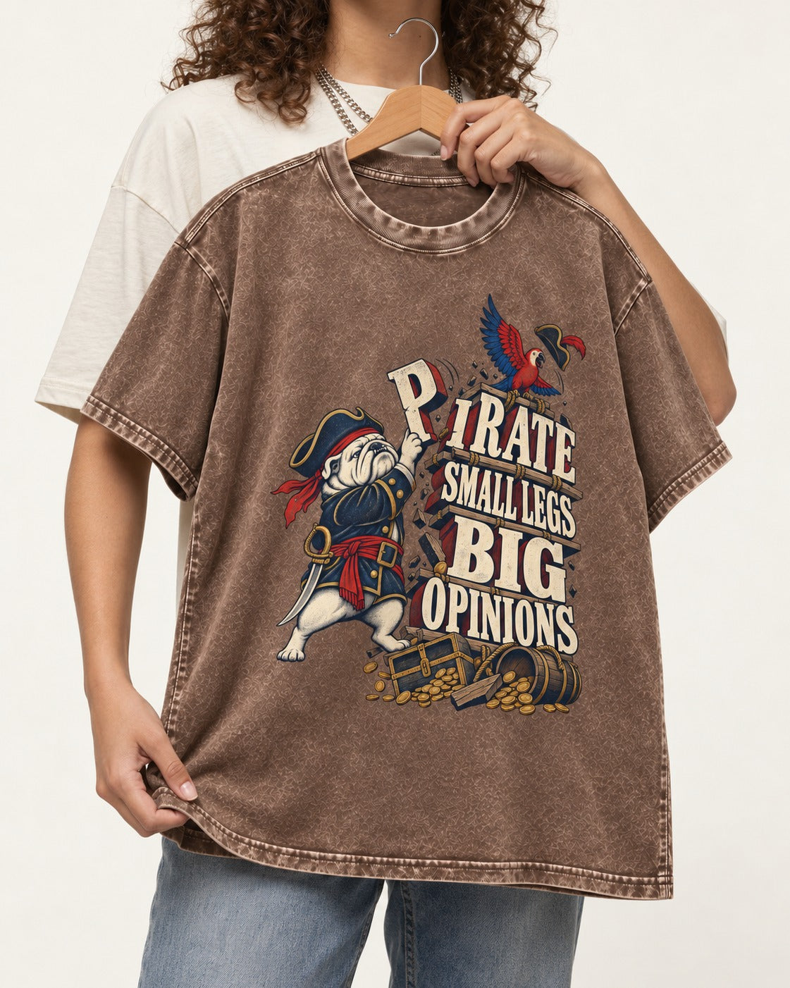Pirate English Bulldog Big Opinions Washed Tee in Coffee, held up on a hanger