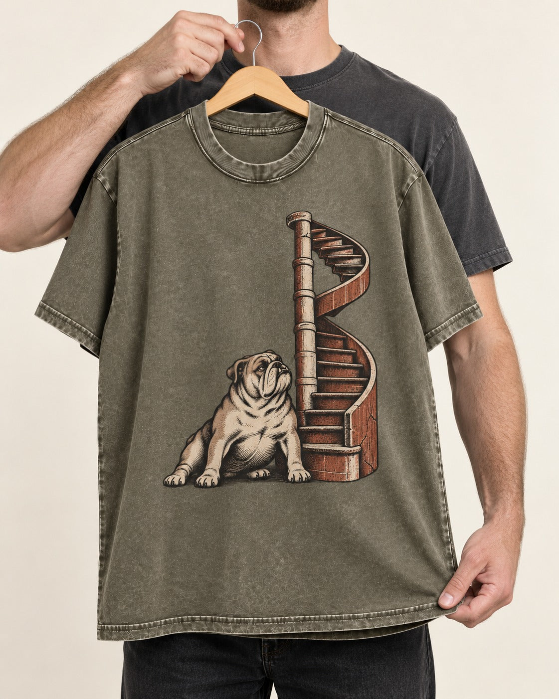 English Bulldog Spiral Staircase Graphic Washed Tee in Army Green, held up on a hanger