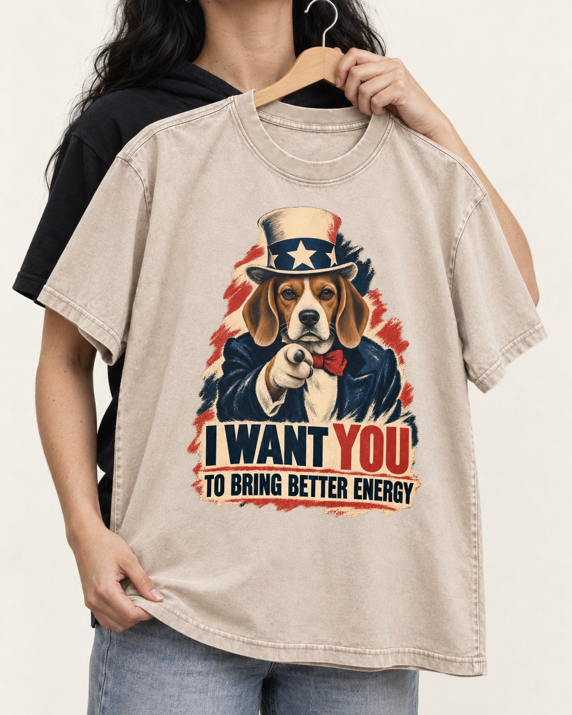 Beagle Wants Better Energy Washed Tee in Apricot, held up on a hanger