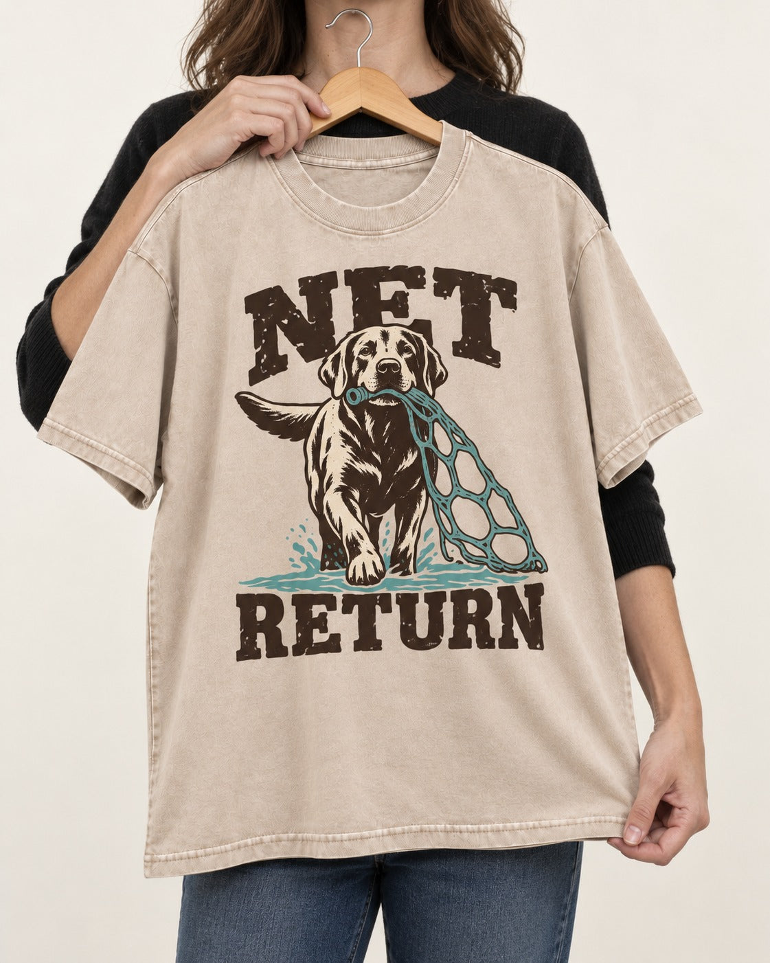 Net Return Labrador Retriever Washed Tee in Apricot, held up on a hanger
