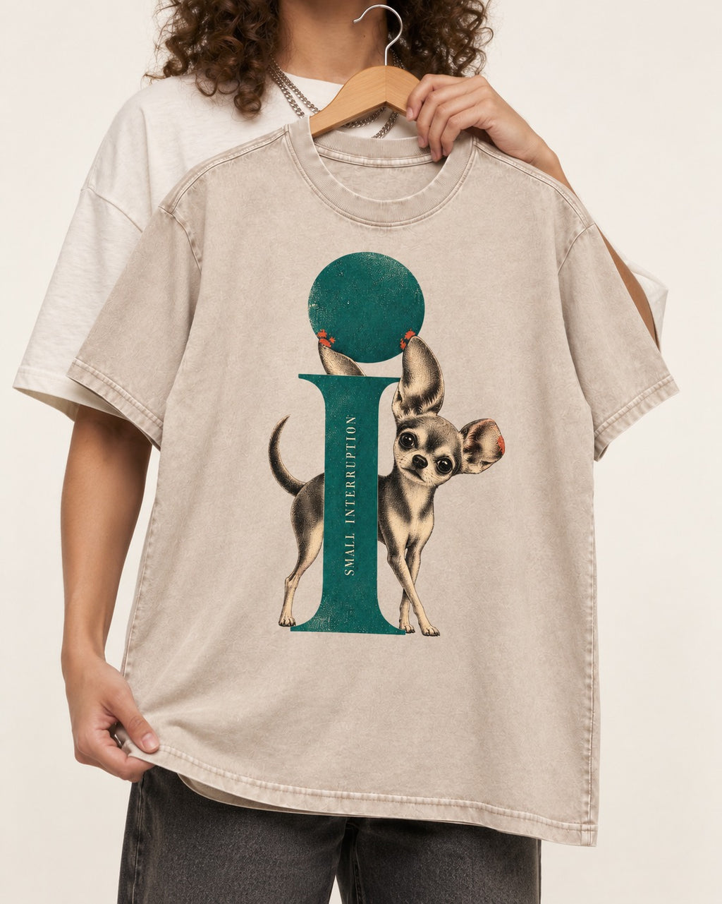 Chihuahua Small Interruption Geometric Portrait Washed Tee in Apricot, held up on a hanger