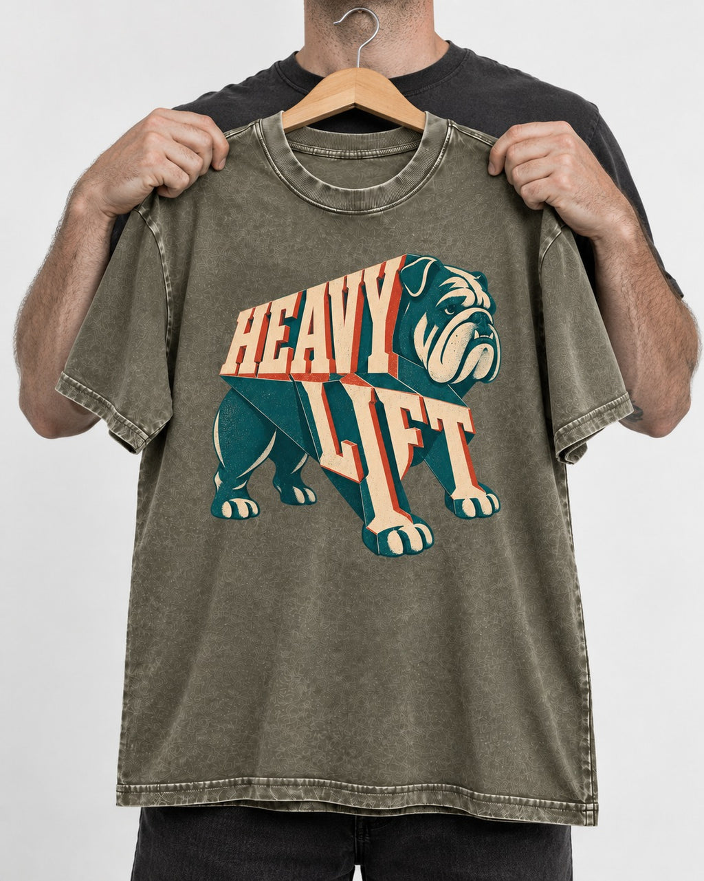 English Bulldog Heavy Lift Dimensional Type Washed Tee in Army Green, held up on a hanger