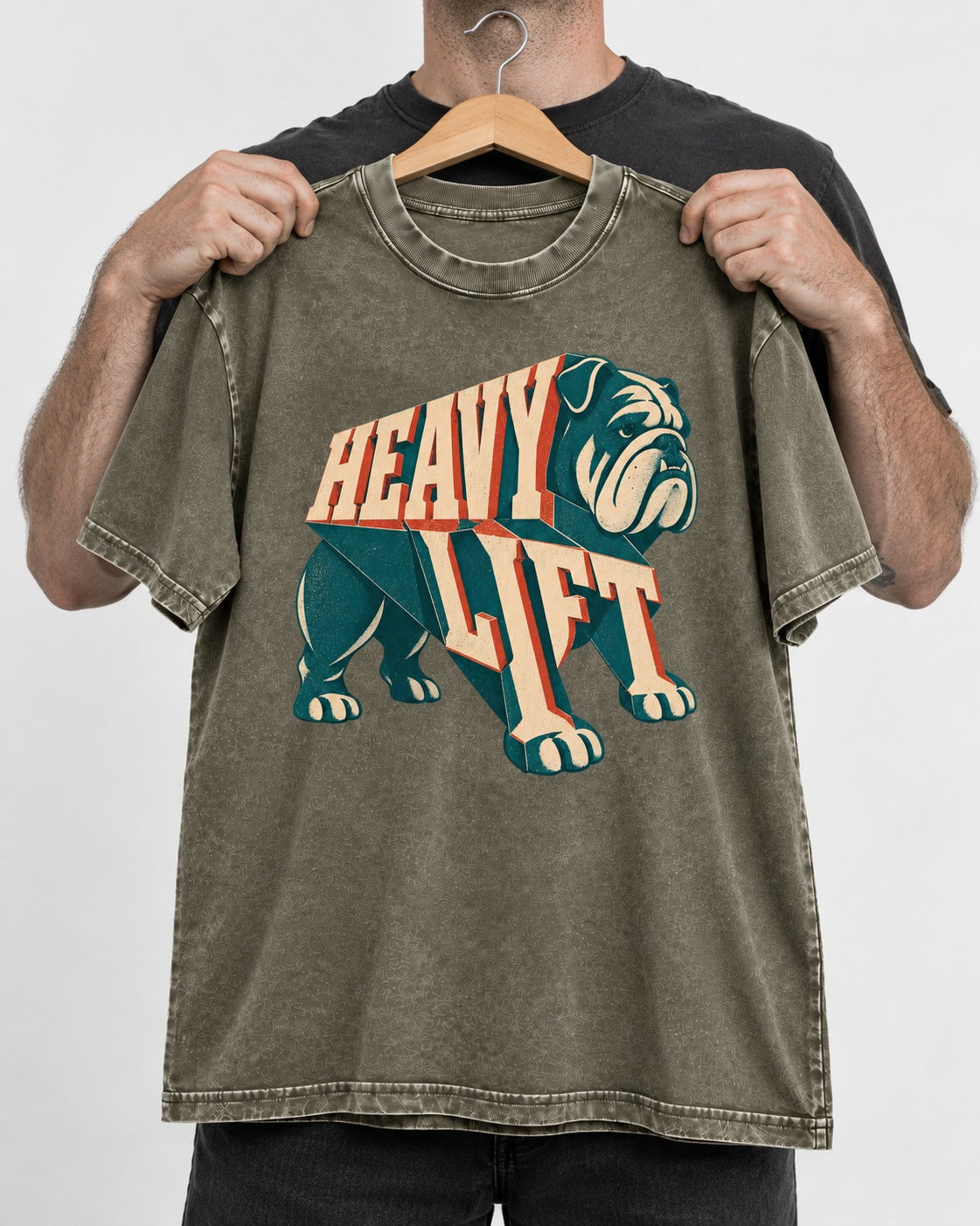 English Bulldog Heavy Lift Dimensional Type Washed Tee in Army Green, held up on a hanger