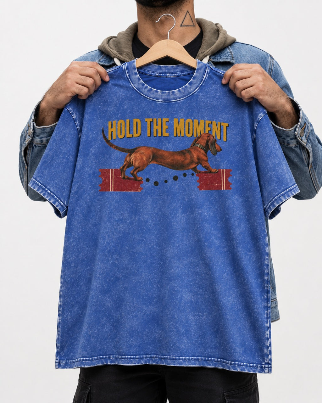 Dachshund Hold The Moment Torn Ticket Bridge Graphic Washed Tee in Royal Blue, held up on a hanger