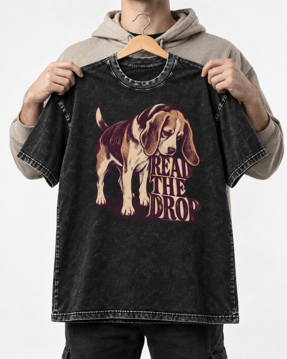 Beagle Read The Drop Washed Tee in Black, held up on a hanger