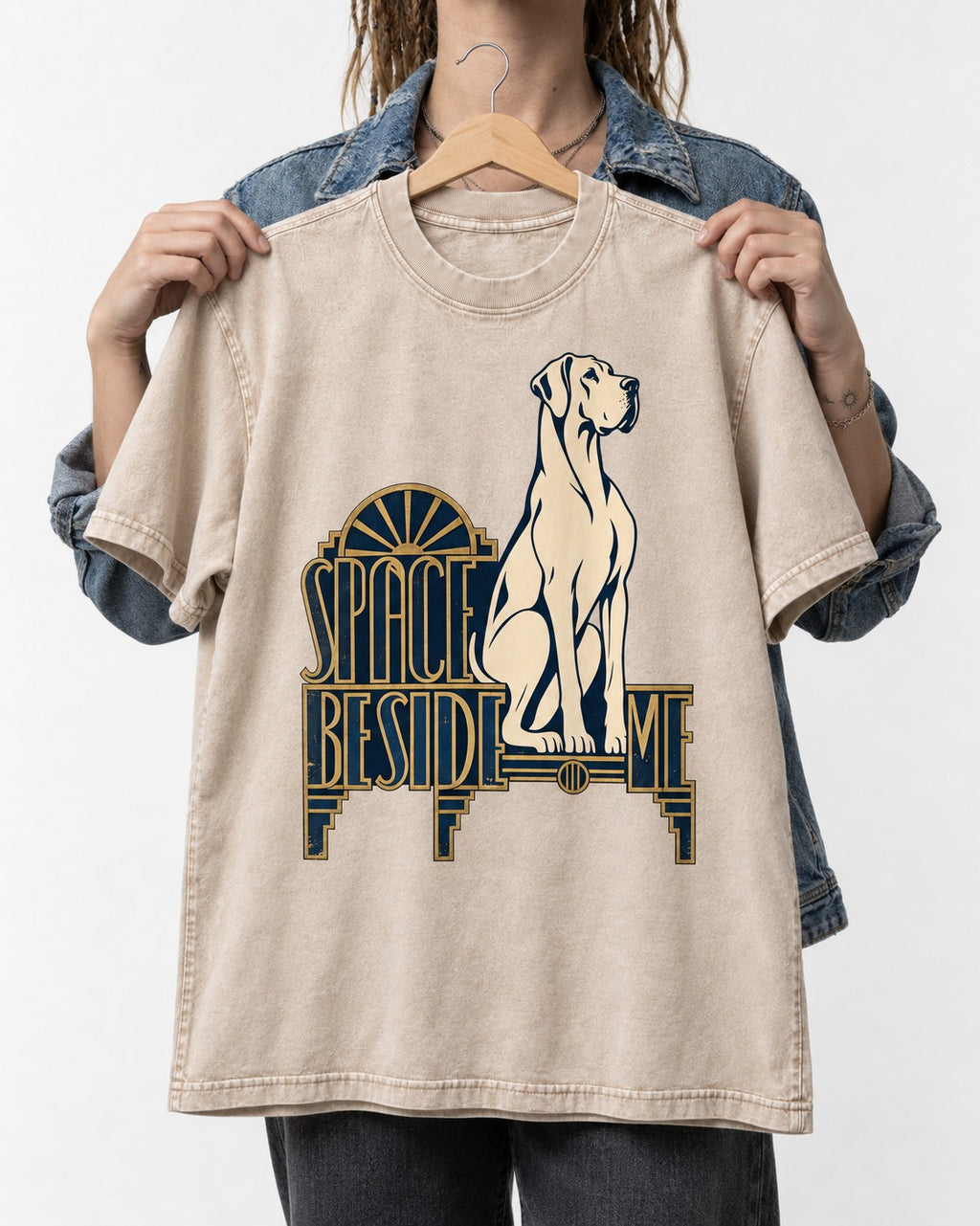 Great Dane's Space Beside Me Washed Tee in Apricot, held up on a hanger