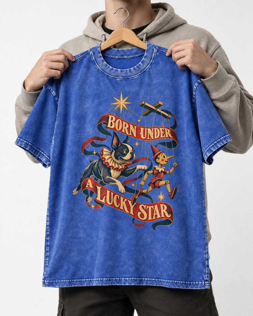 Born Under a Lucky Star Boston Terrier Washed Tee in Royal Blue, held up on a hanger