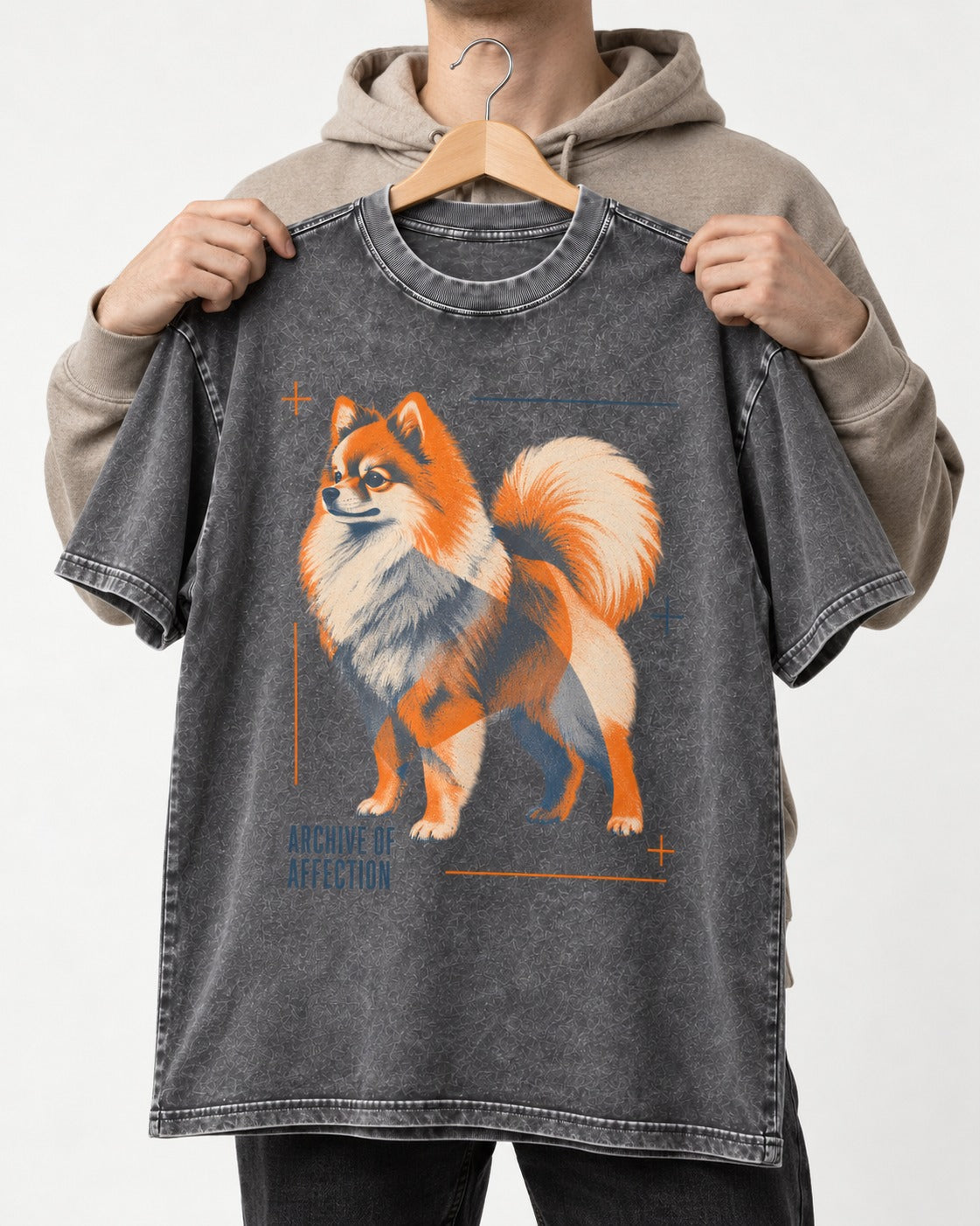 Pomeranian Archive of Affection Washed Tee in Gray, held up on a hanger