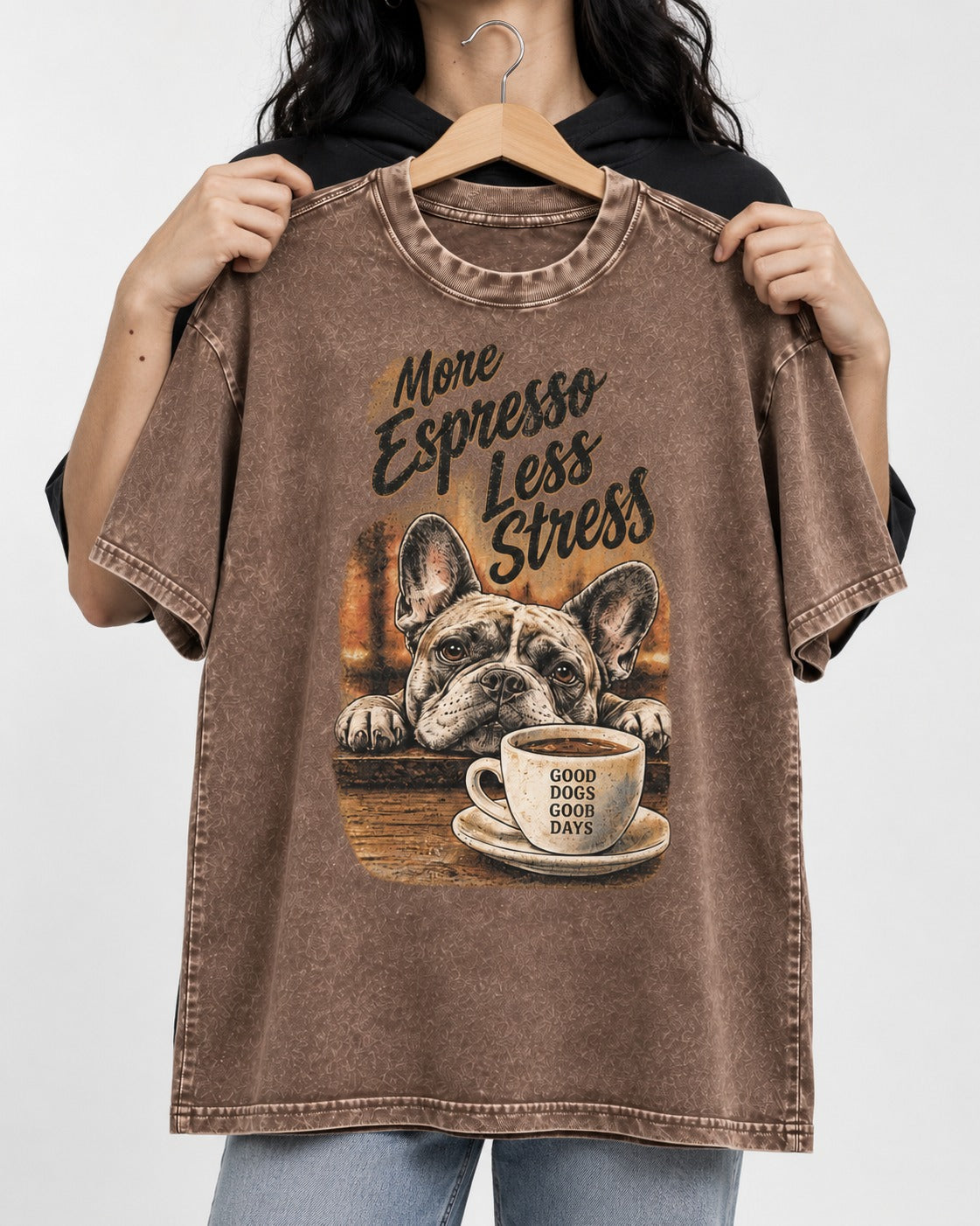 Frenchie More Espresso Less Stress Washed Tee in Coffee, held up on a hanger