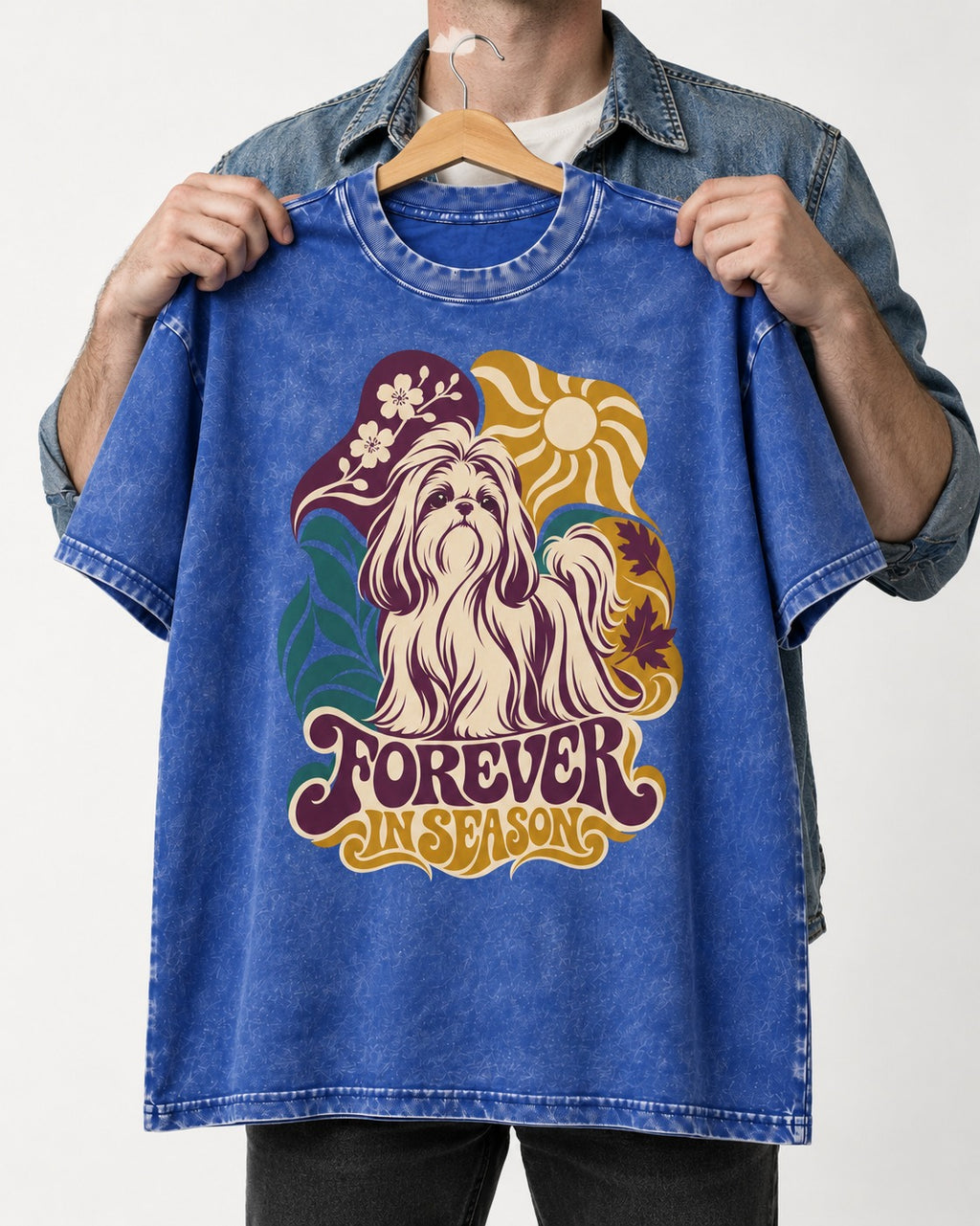 Shih Tzu Forever in Season Botanical Sun Graphic Washed Tee in Royal Blue, held up on a hanger