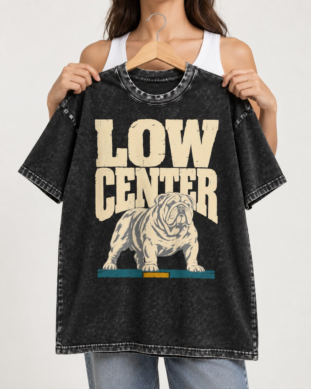English Bulldog Low Center Stance Graphic Washed Tee in Black, held up on a hanger