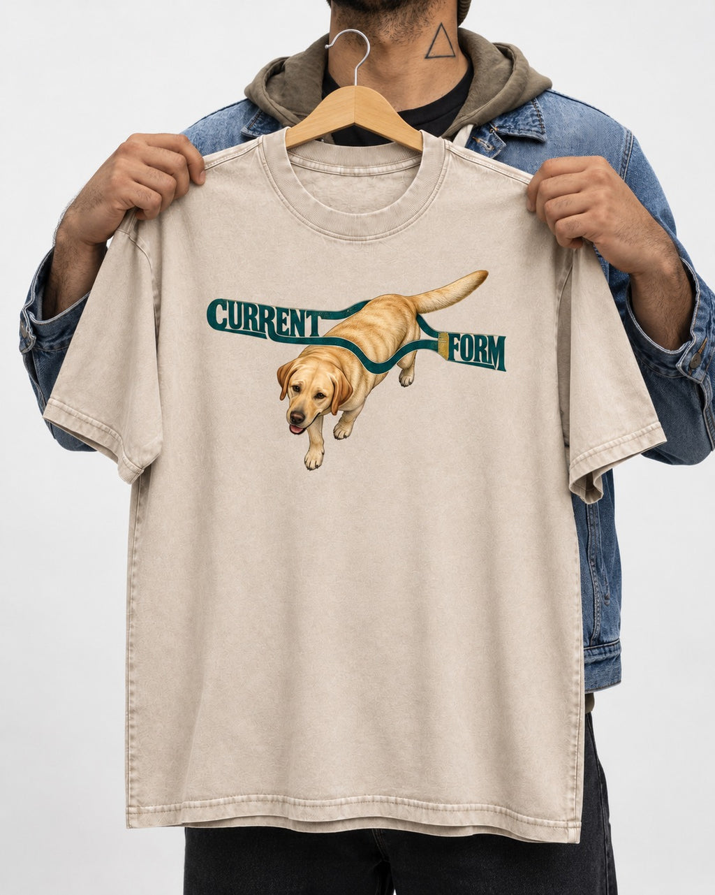 Labrador Retriever Current Form Washed Tee in Apricot, held up on a hanger