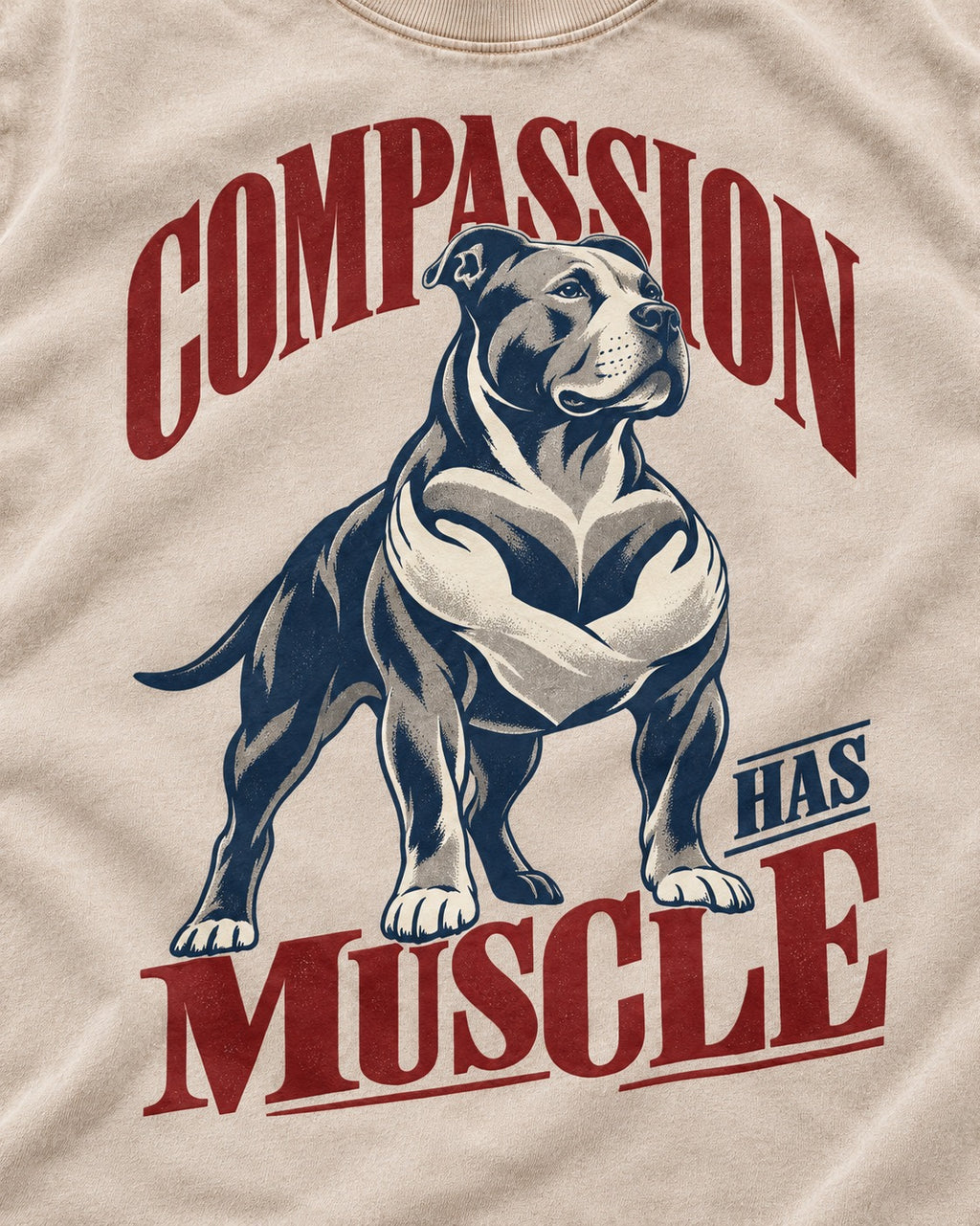 Pitbull Compassion Has Muscle Washed Tee in Apricot, close-up of the graphic