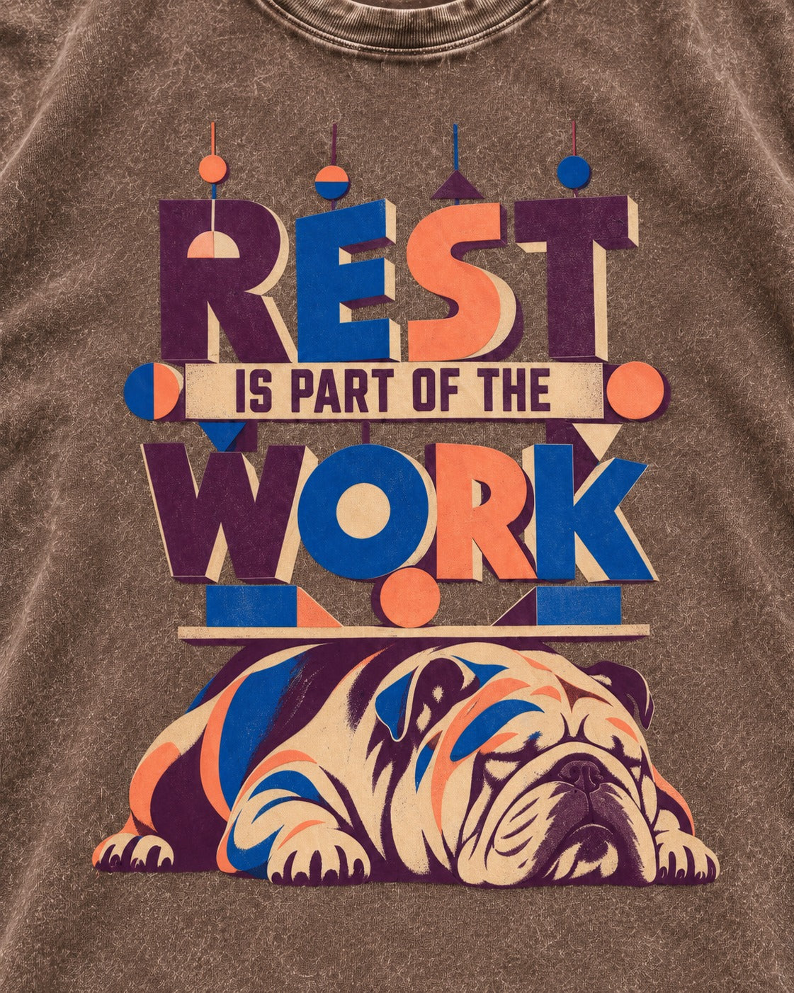 Rest Is Work English Bulldog Washed Tee in Coffee, close-up of the graphic
