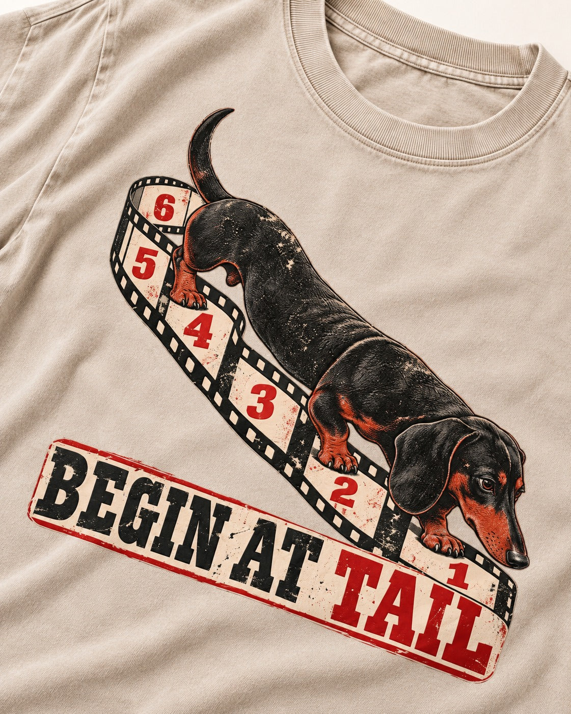 Begin at Tail Dachshund Washed Tee in Apricot, close-up of the graphic