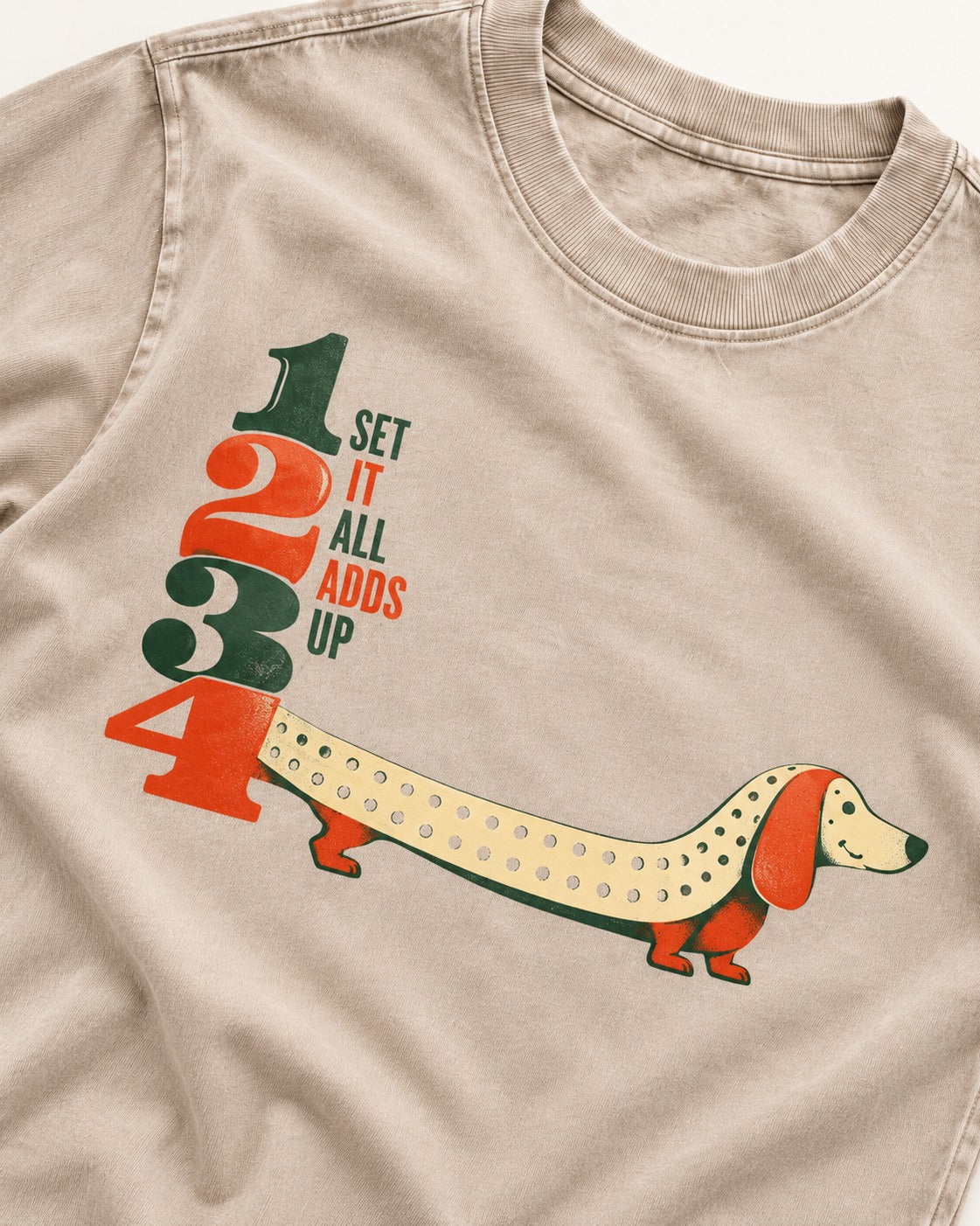 Dachshund Adds Up Washed Tee in Apricot, close-up of the graphic
