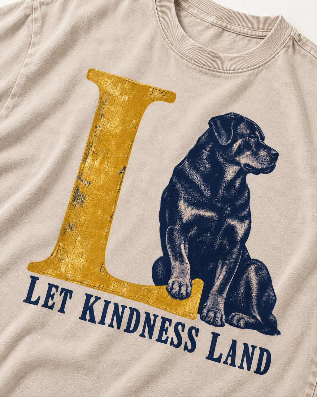 Let Kindness Lead Rottweiler Washed Tee in Apricot, close-up of the graphic