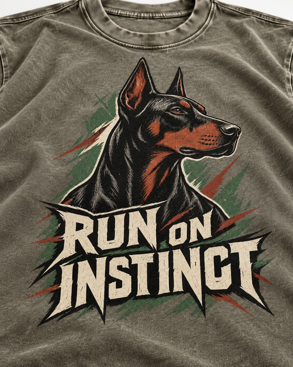 Doberman Run on Instinct Brush Slash Graphic Washed Tee in Army Green, close-up of the graphic