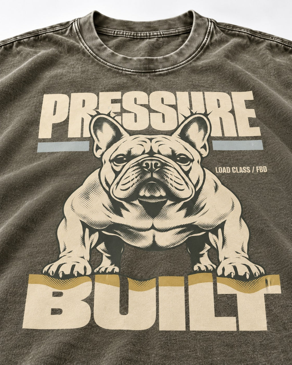 Frenchie Pressure Built Load Class Graphic Washed Tee in Army Green, close-up of the graphic