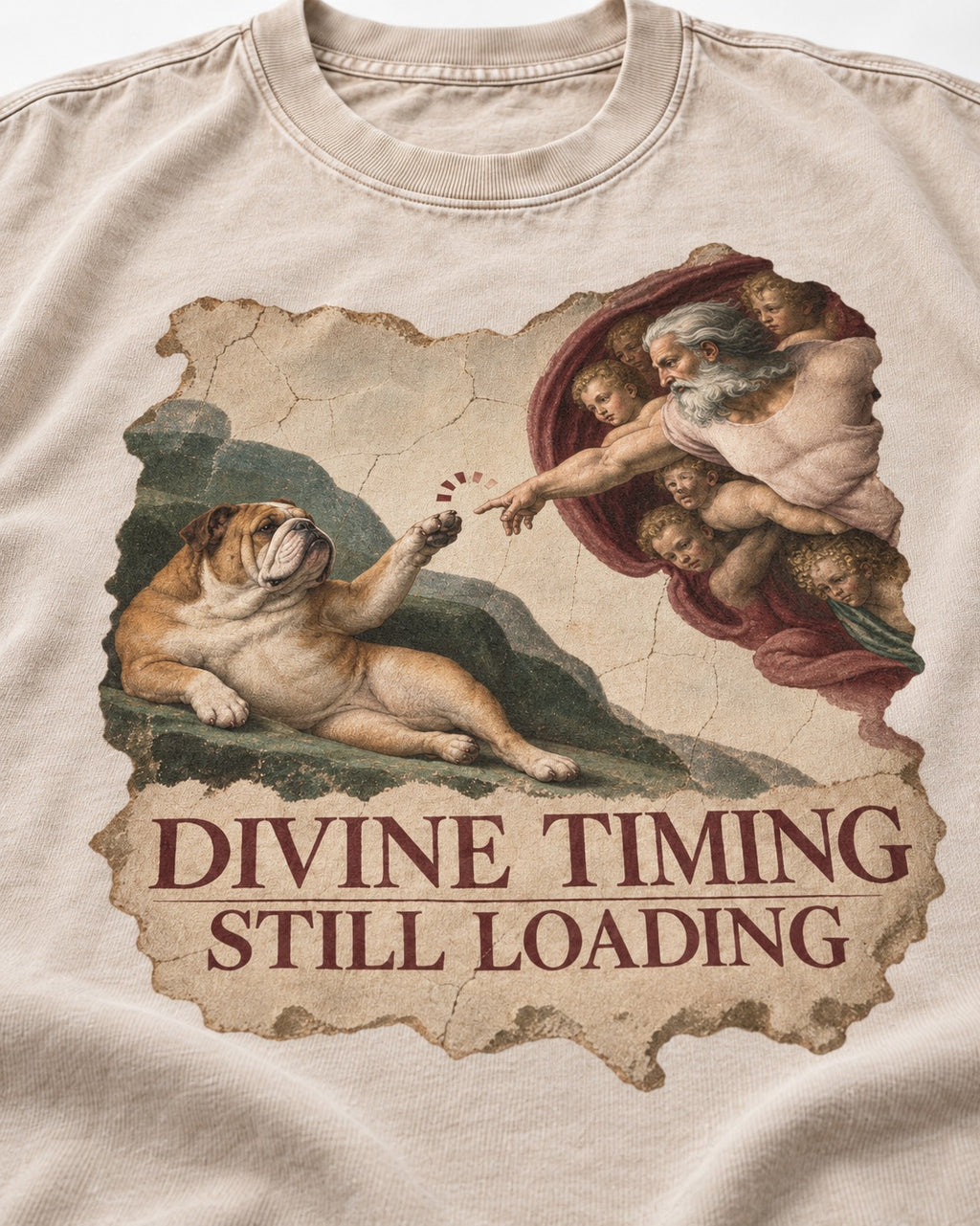 English Bulldog Divine Timing Still Loading Washed Tee in Apricot, close-up of the graphic