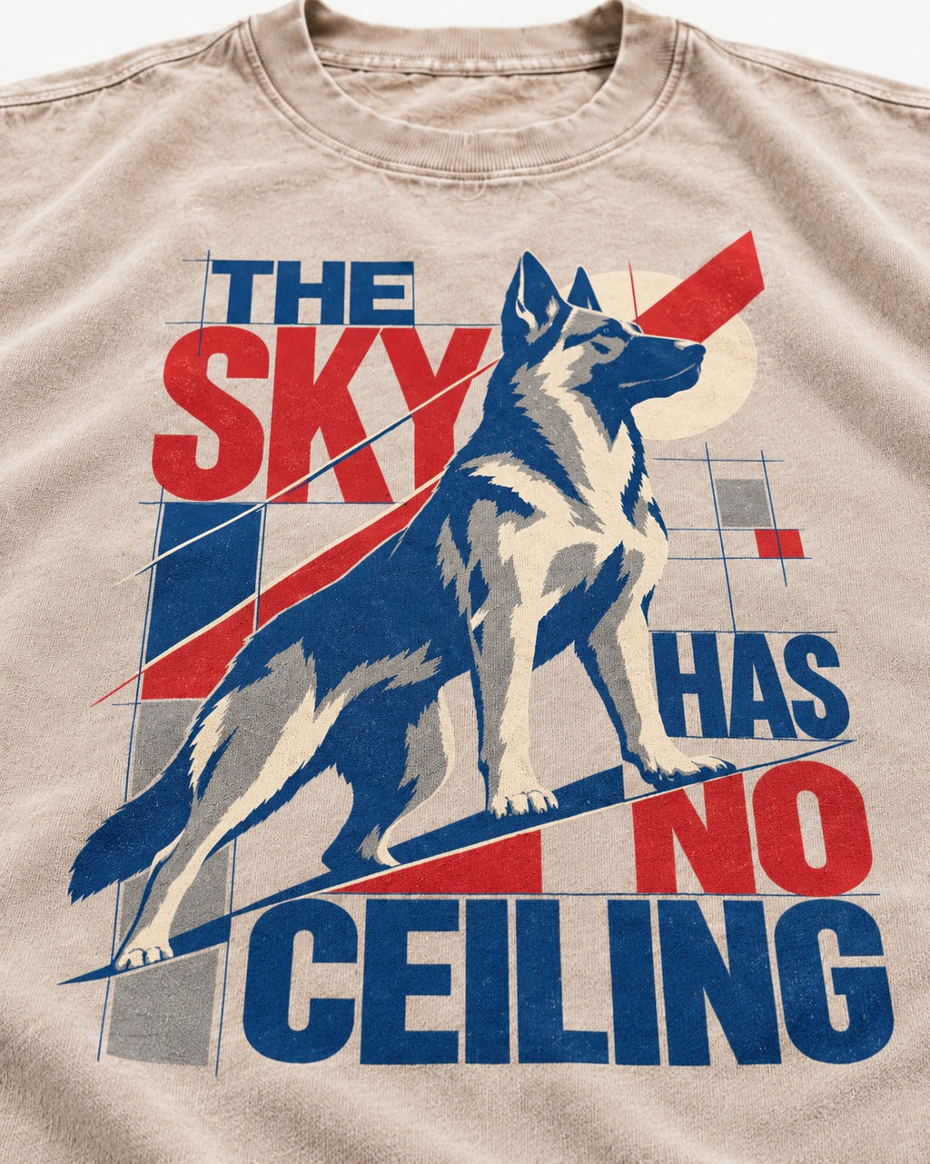 Sky Has No Ceiling German Shepherd Dog Washed Tee in Apricot, close-up of the graphic