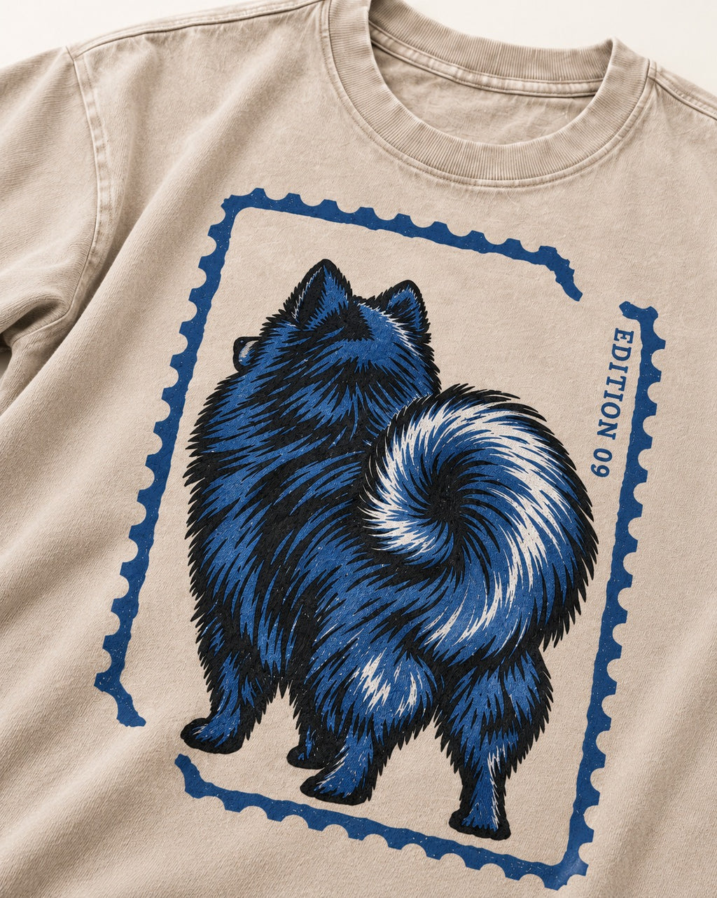 Pomeranian Pride Washed Tee in Apricot, close-up of the graphic