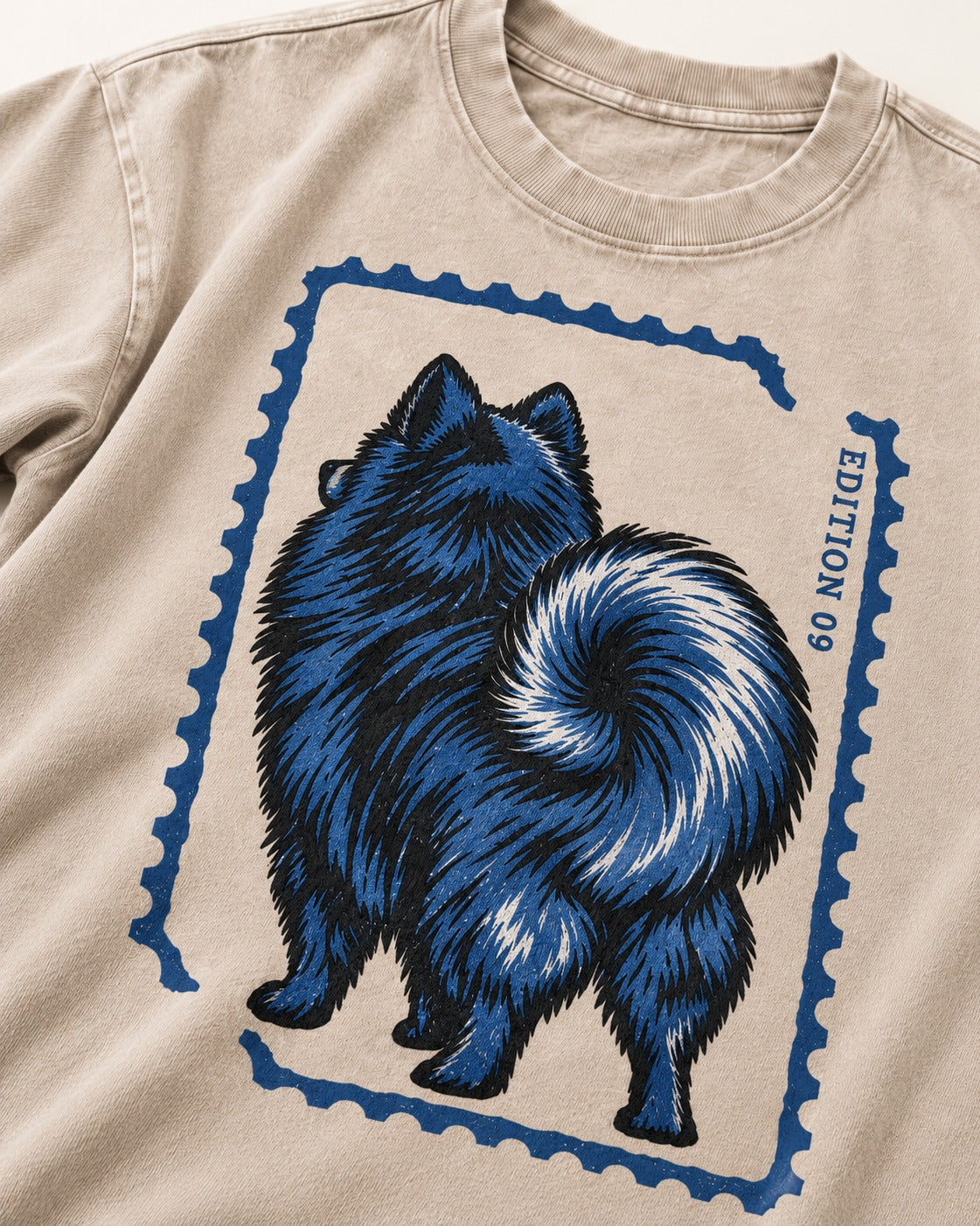 Pomeranian Pride Washed Tee in Apricot, close-up of the graphic
