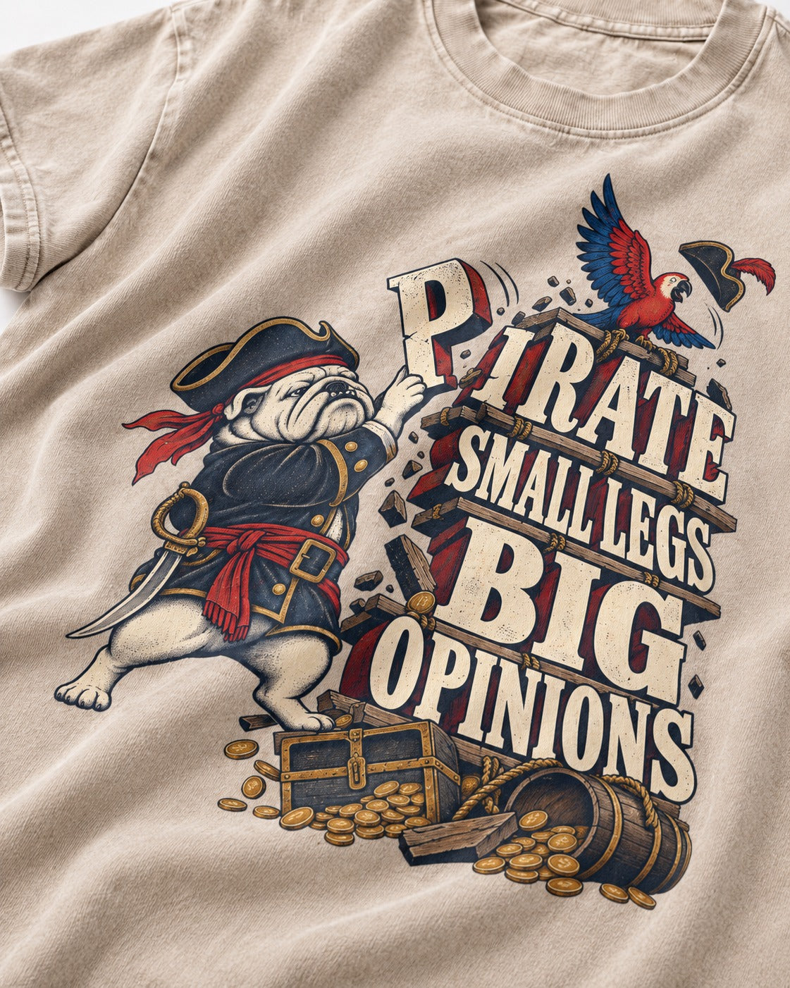 Pirate English Bulldog Big Opinions Washed Tee in Apricot, close-up of the graphic