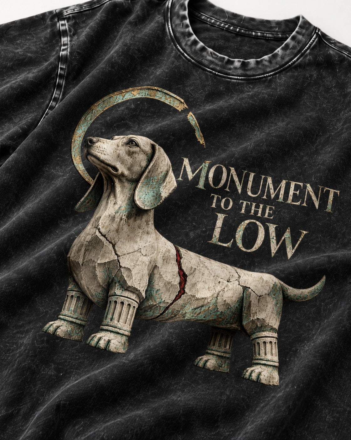 Dachshund Monument to the Low Stone Statue Graphic Washed Tee in Black, close-up of the graphic