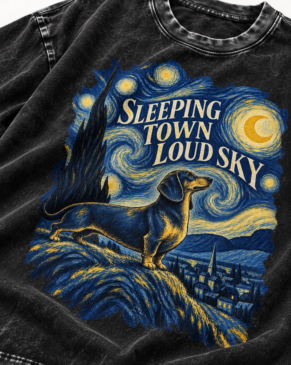 Dachshund Sleeping Town Loud Sky Starry Night Graphic Washed Tee in Black, close-up of the graphic