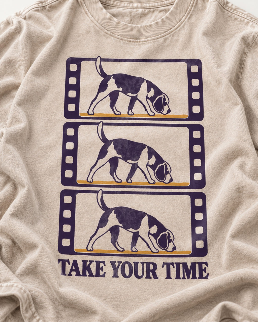 Beagle Take Your Time Washed Tee in Apricot, close-up of the graphic