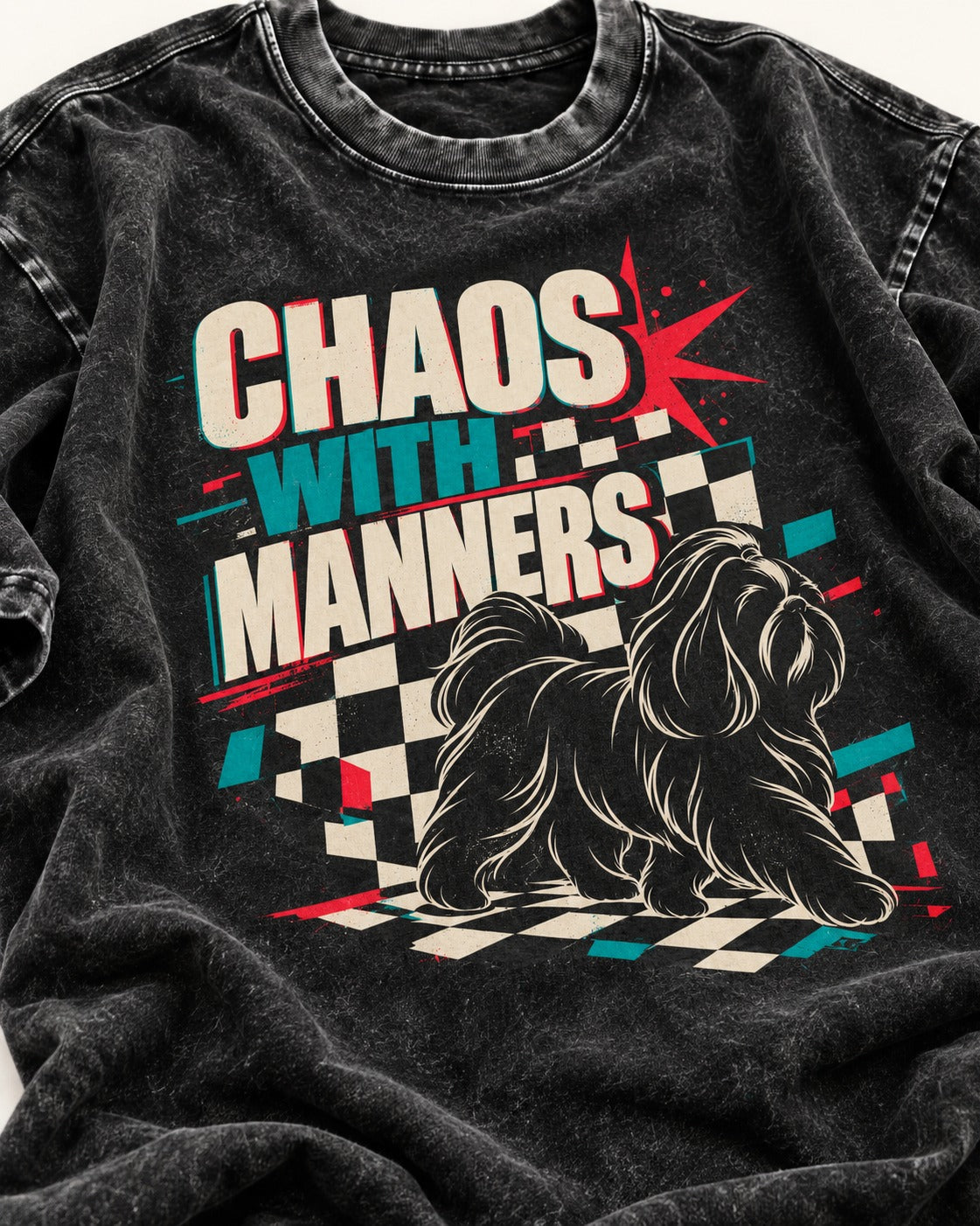 Shih Tzu Chaos with Manners Checkerboard Graphic Washed Tee in Black, close-up of the graphic
