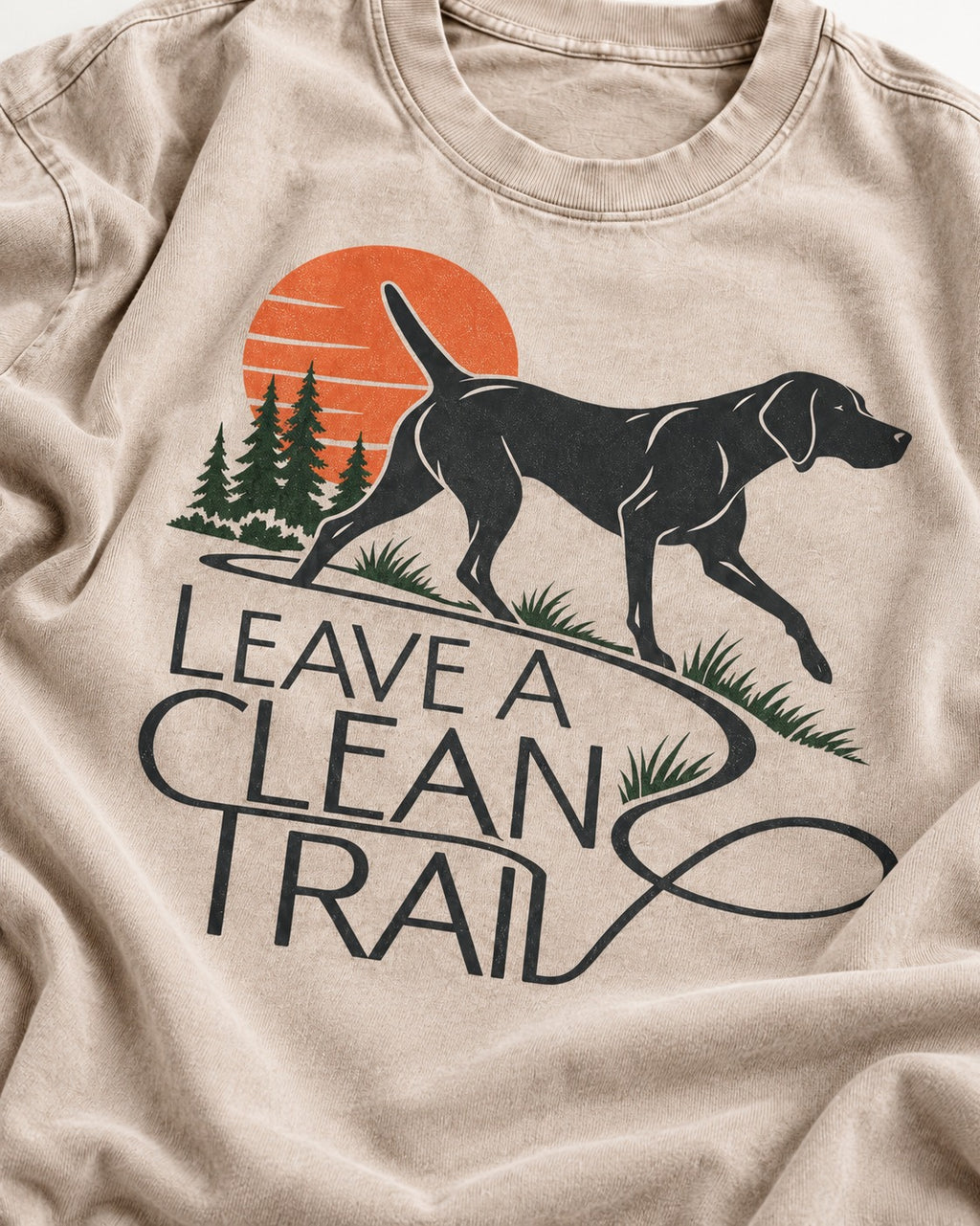 Leave a Clean Trail German Shorthaired Pointer Washed Tee in Apricot, close-up of the graphic