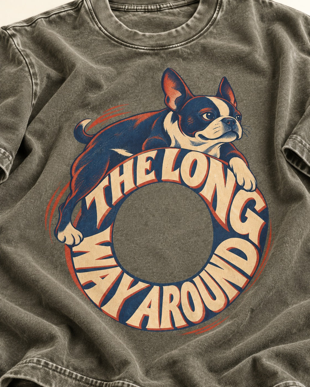 Boston Terrier the Long Way Around Washed Tee in Army Green, close-up of the graphic