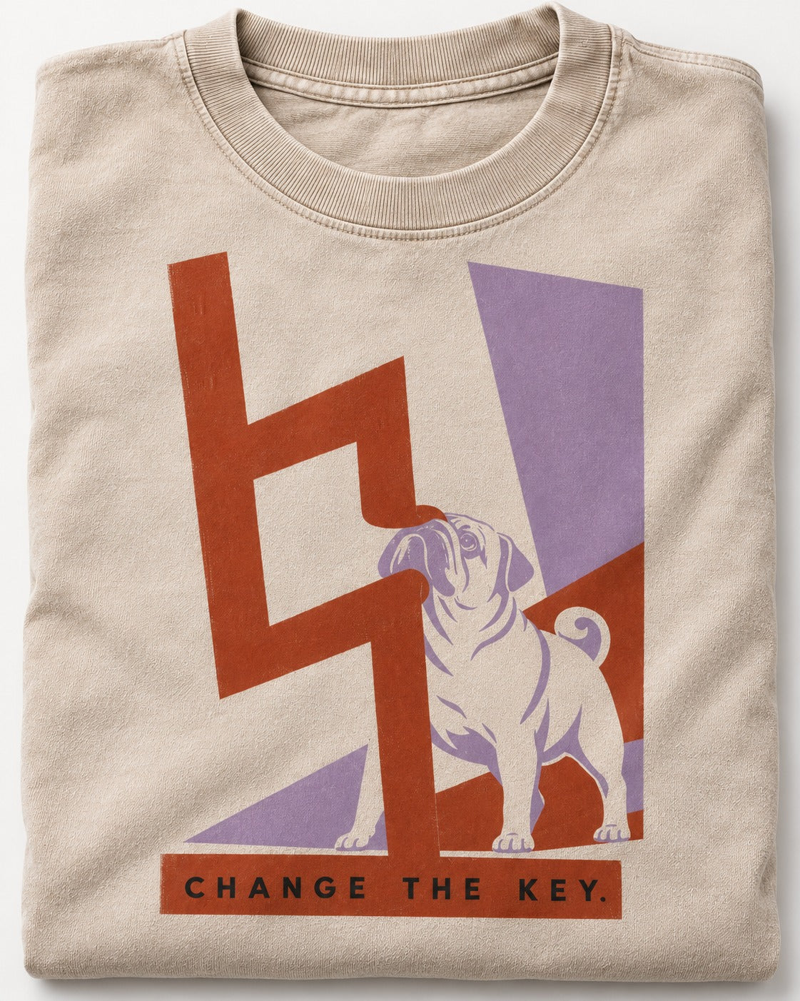Pug Change the Key Washed Tee in Apricot, close-up of the graphic