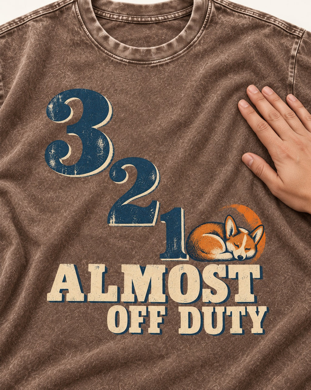 Corgi Almost Off Duty Washed Tee in Coffee, close-up of the graphic