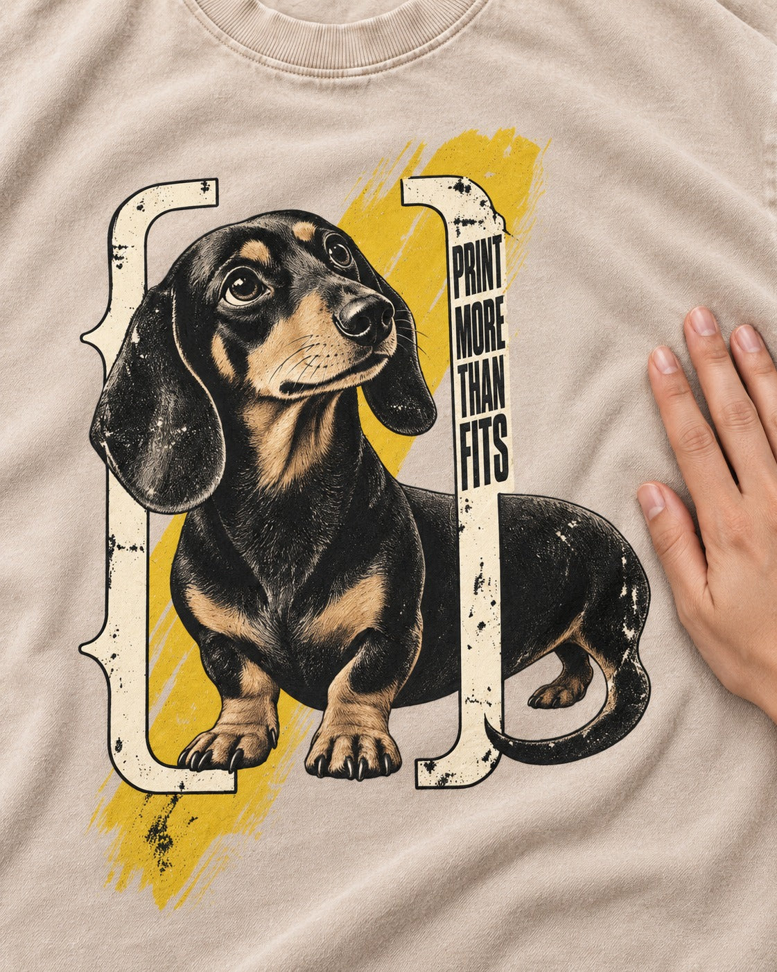 Dachshund More Than Fits Washed Tee in Apricot, close-up of the graphic